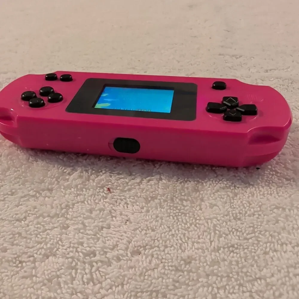 16-Bit Handheld System Pink 2.0in Screen 100 Preloaded Games Battery Powered